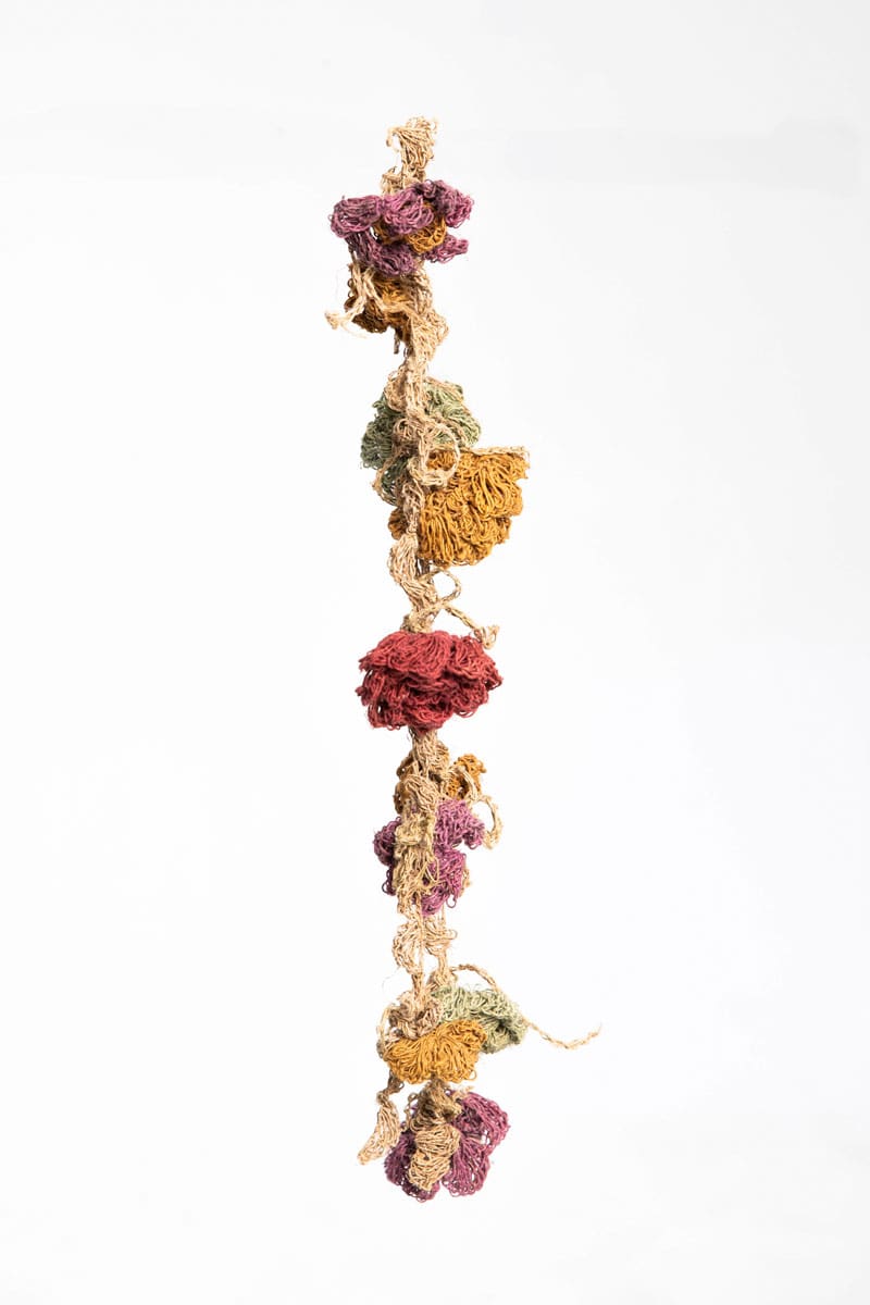 Banda pelo crochet con flores
