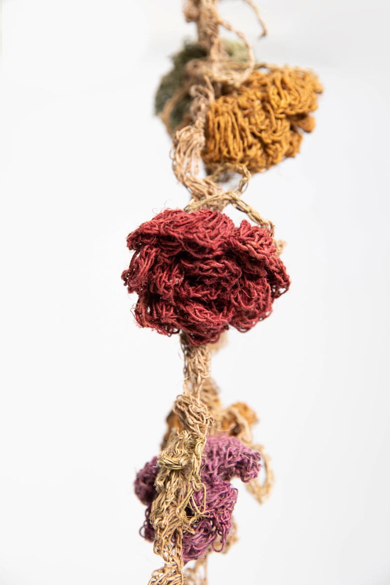 Banda pelo crochet con flores