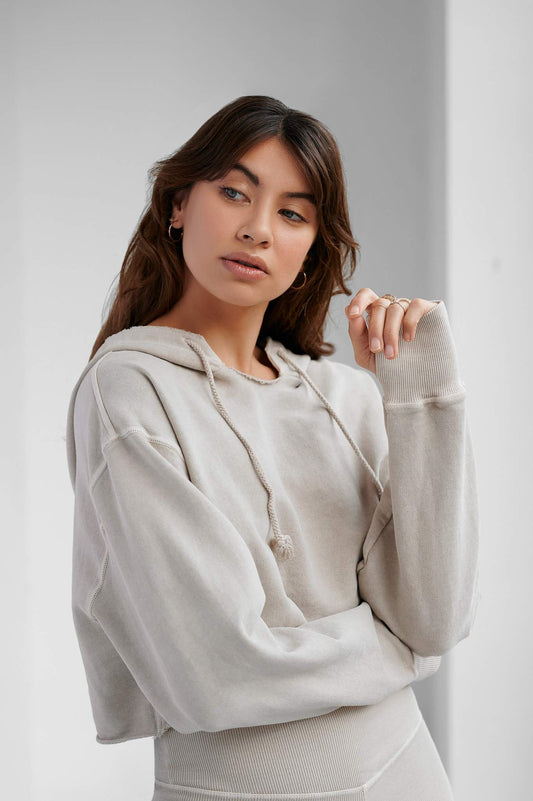 Made in Barcelona · 100 % Premium Organic Cotton · Made to Last · Environmental Friendly Dye · Extremely soft fabric  · Brushed finish on the inside for a warm, smooth feeling · Easy-to-Wear and Match · Loose/Oversized fit · Raw cut on waist · Low shoulder · Oversized sleeves · Thumbholes · Worn-out feel · Light Beige