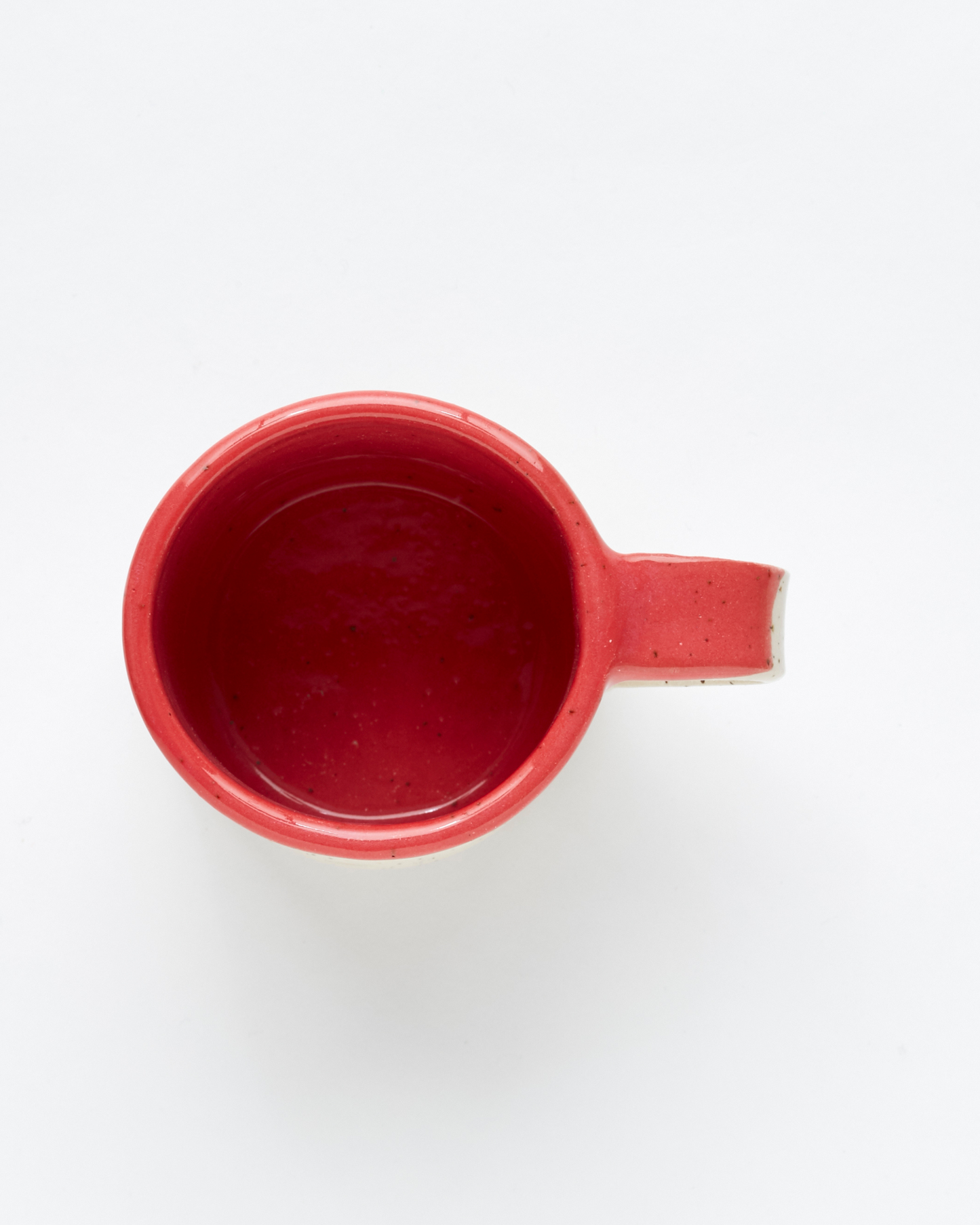 Handmade red ceramic mug