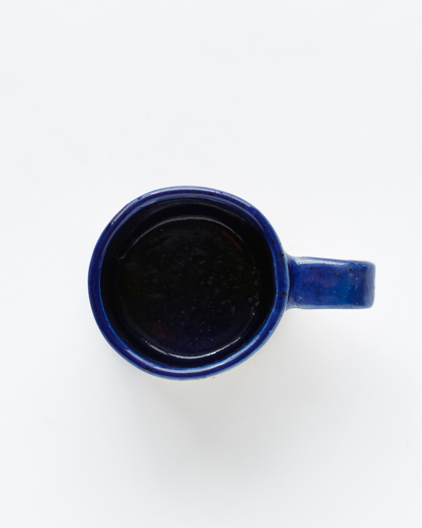 Handmade bright blue ceramic mug