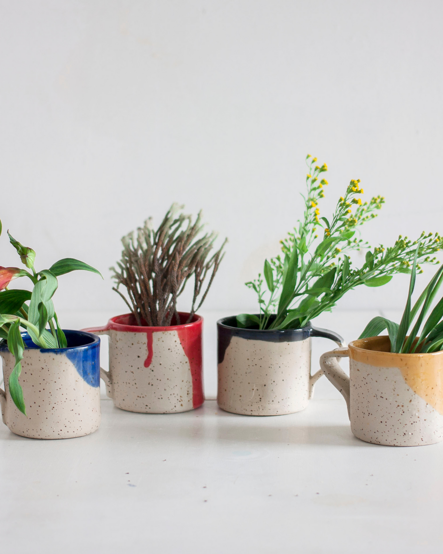 Handmade red ceramic mug