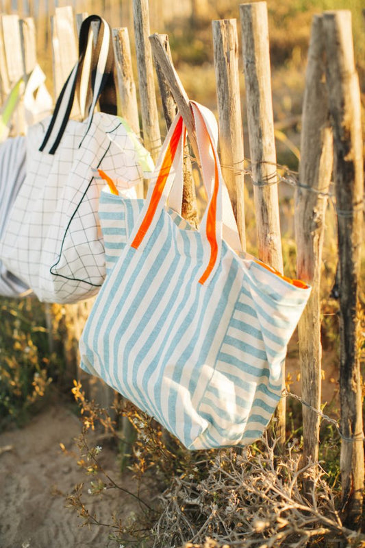 Turquoise and fluorine striped resin-coated cotton beach bag