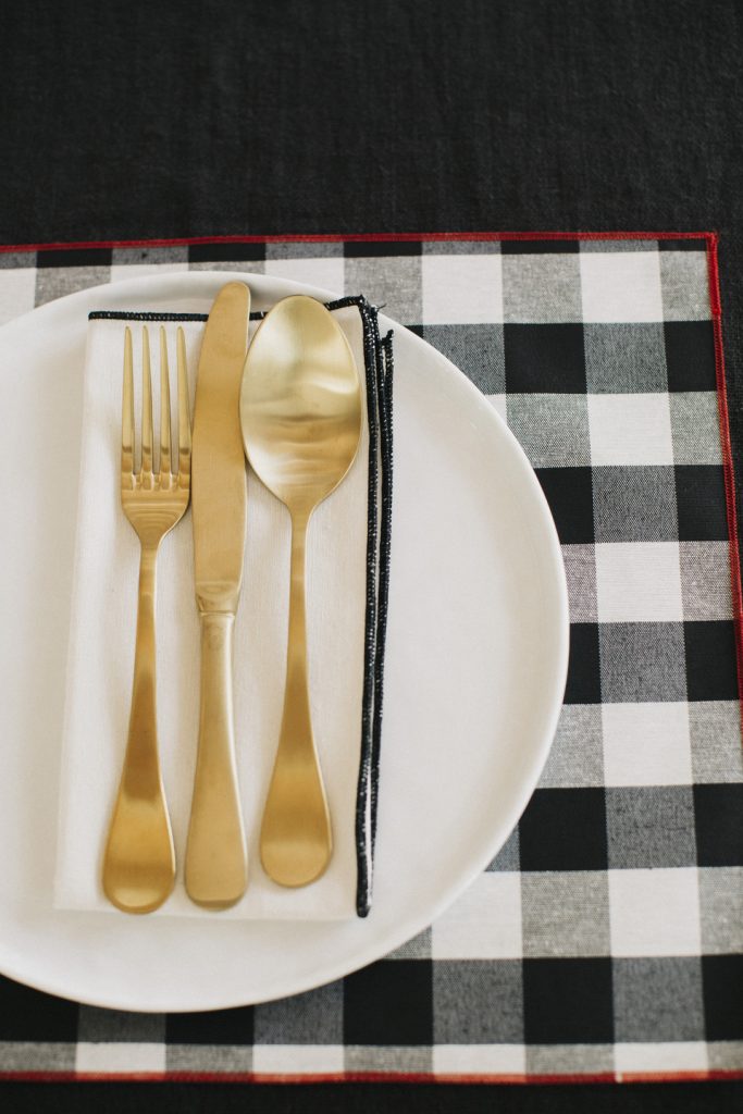 Black gingham print cotton placemat with red trim (2 units)