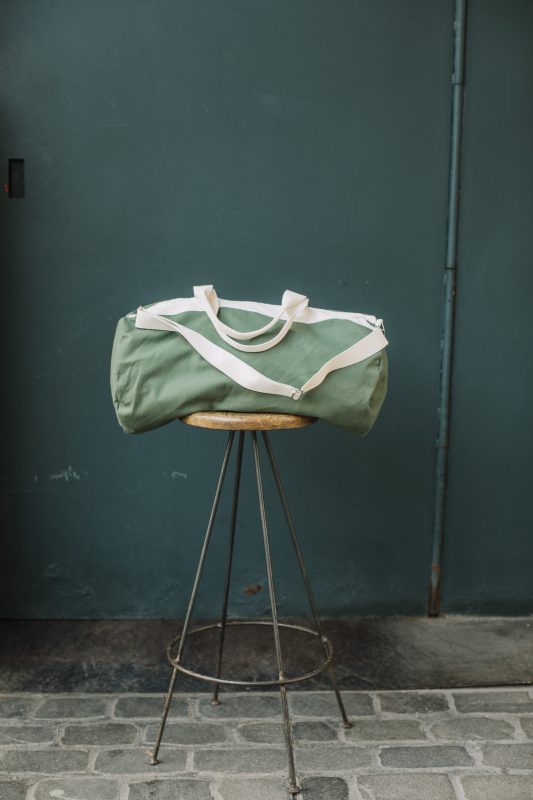 Tristán green canvas travel bag for children