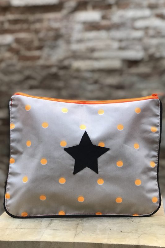 Beige resin beach bag with fluorescent orange polka dots