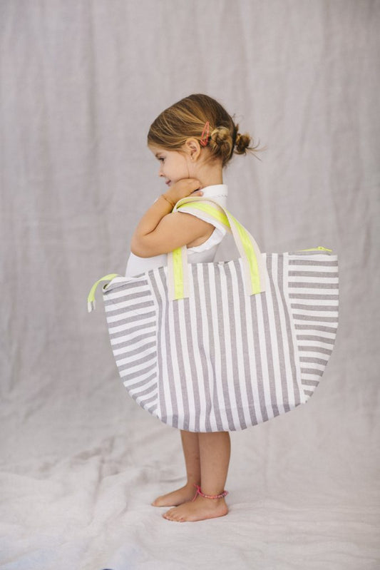 Children's beach bag in resin-coated linen with gray and fluorine stripes