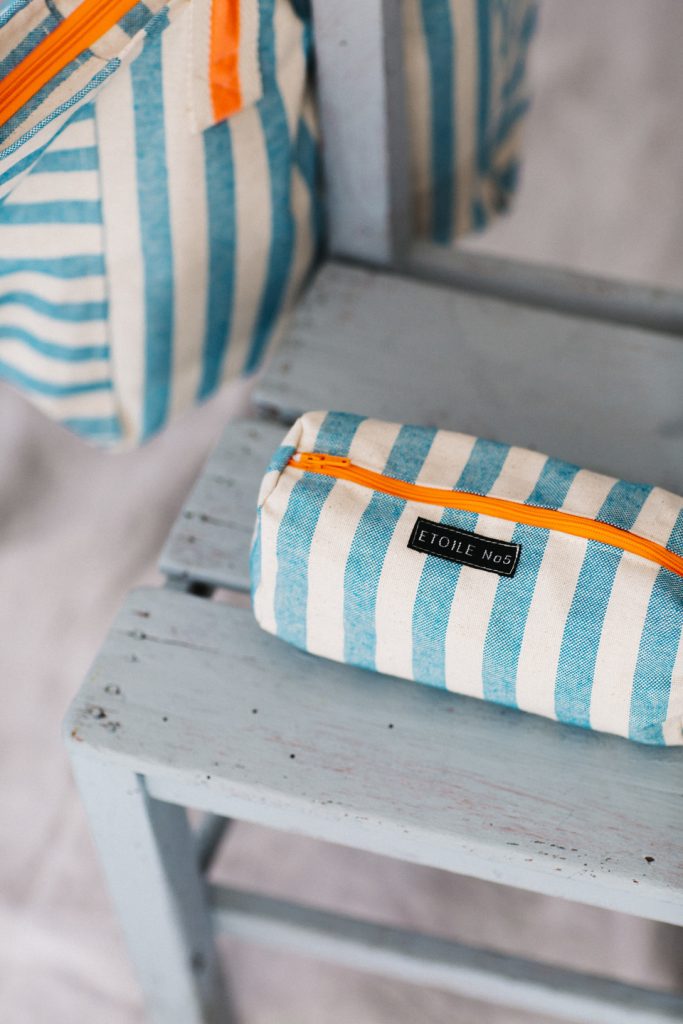 Turquoise striped resin toiletry bag for children